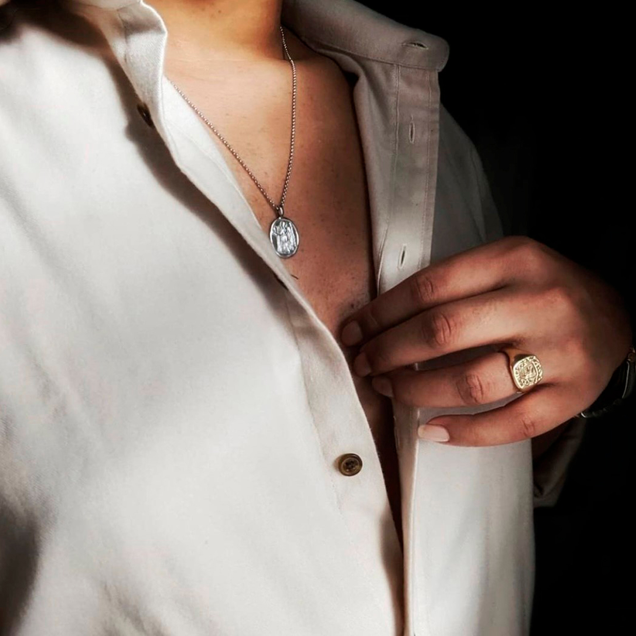 Gold cushion signet ring